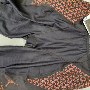 Nike Men's Black Athletic Shorts with Orange Accents